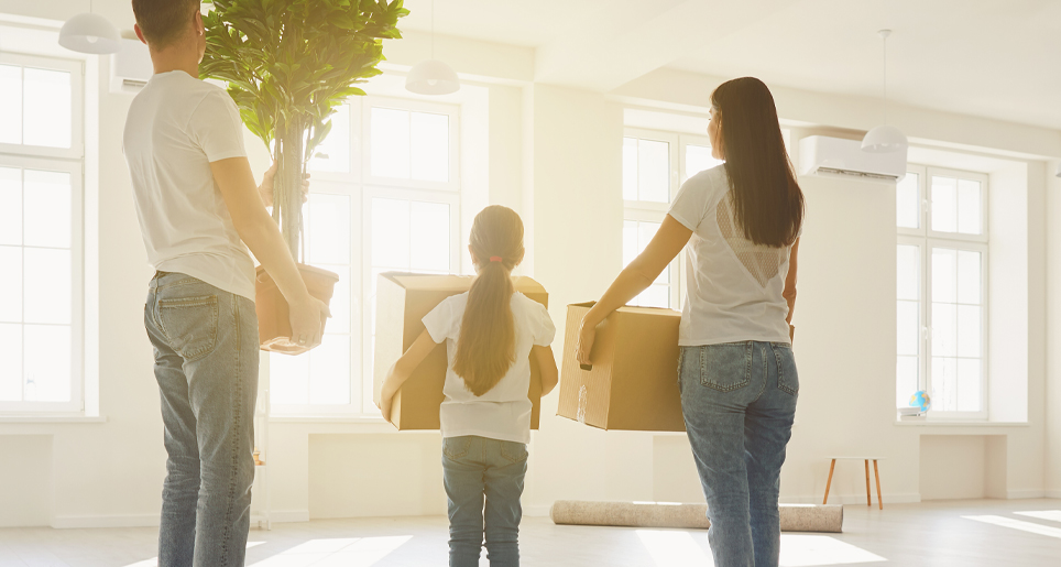 young family moving into new home