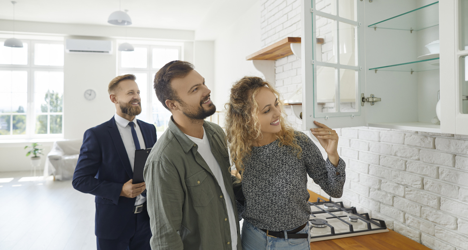 couple looking at kitchen
